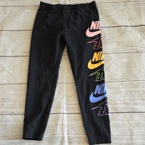 Nike Black and Pink Leggings with Bold Logo Design